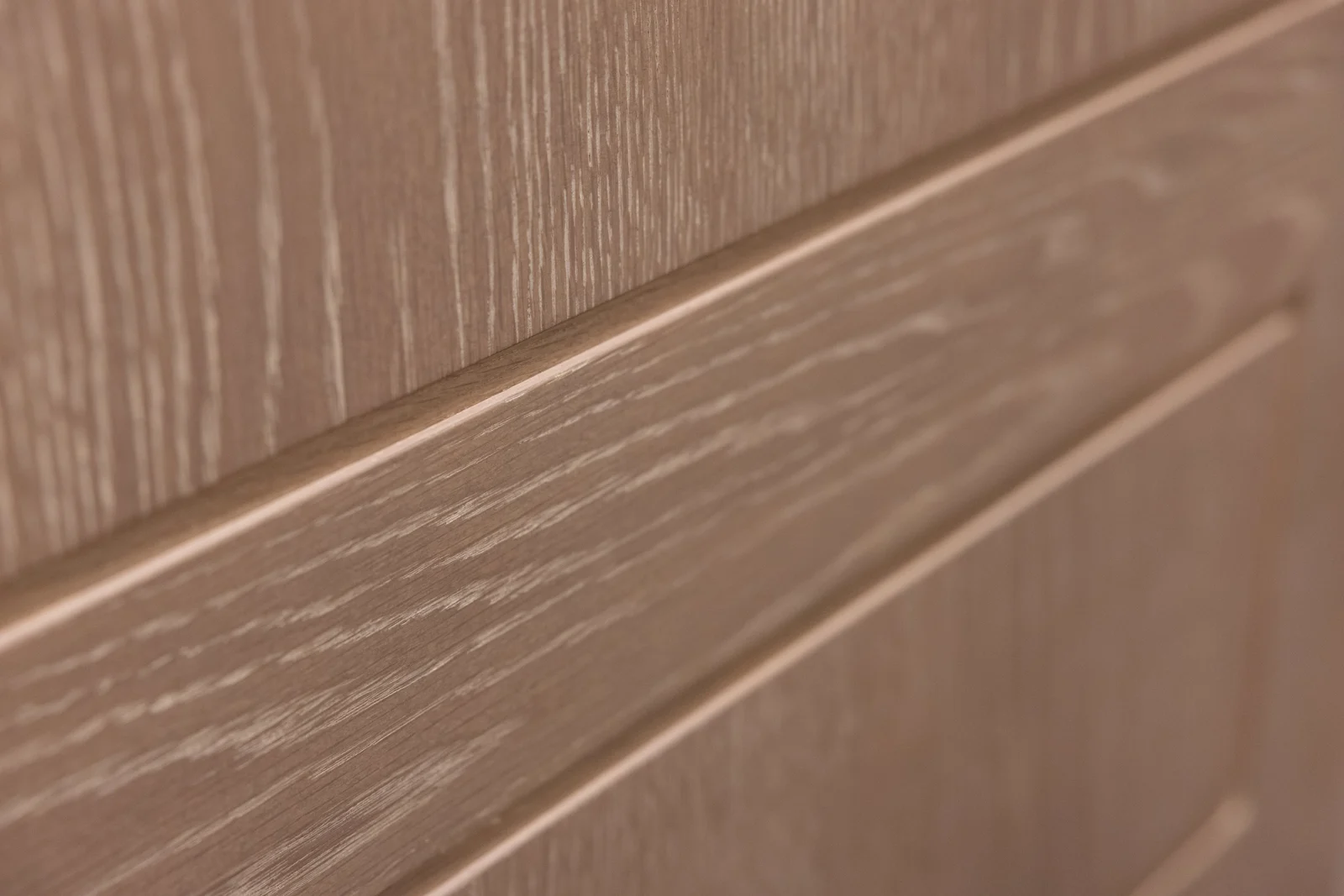 Close-up of the taupe finish on a door panel